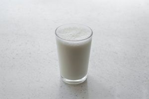 glass of milk on counter